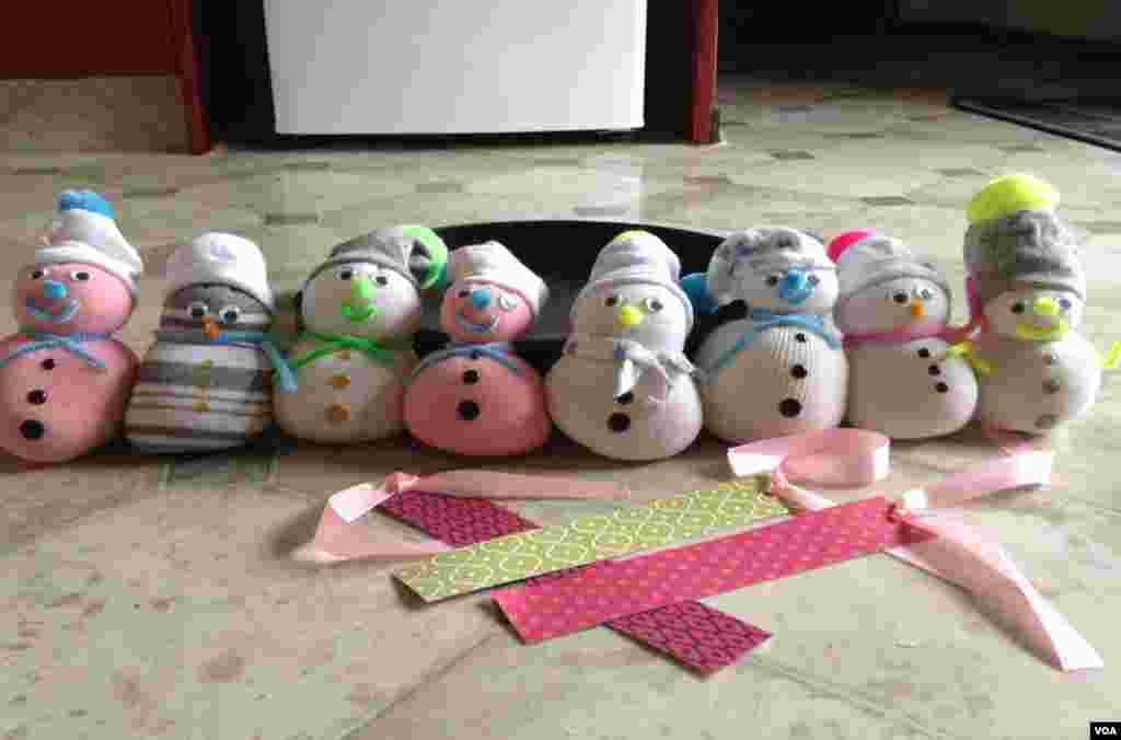 These snowman made by twin sister Shavali and Sheffali are selling for $10 each. They are part of fundraising activities for the Zimbabwe Rural School Library Trust meant to capacitate poor rural libraries.