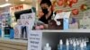 A pharmacy displays a sign to inform customers that Rapid Antigen Test kits are sold out in wake of the coronavirus disease in Sydney, Australia, Jan. 5, 2021. 