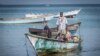 A fisherman comes in with his boat to Bossaso's fishing beach in northern Somalia in late March 2018. (J. Patinkin/VOA)