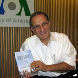 James Zogby with a copy of his new book, 'Arab Voices.'