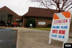 Voters in Precinct 1 in Lexington, S.C., head into the Saxe Gotha Presbyterian Church to cast ballots in the state's Republican primary, Feb. 20, 2016. (B. Allen/VOA)