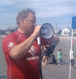 AmpSurf founder Dana Cummings welcomes participants to a surfing class in Maine