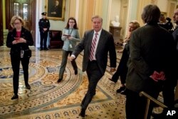 FILE - Sen. Lindsey Graham, a South Carolina Republican, walks to a meeting with Senate Republicans on Capitol Hill in Washington, Jan. 10, 2019.