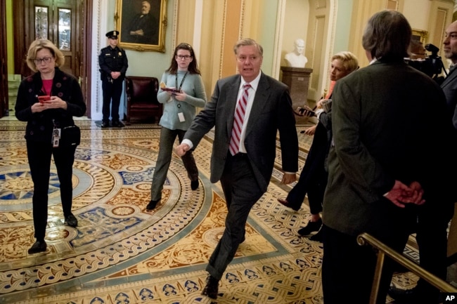 FILE - Sen. Lindsey Graham, a South Carolina Republican, walks to a meeting with Senate Republicans on Capitol Hill in Washington, Jan. 10, 2019.
