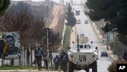 Serbian U.N peacekeepers patrol the Lebanese side of the Lebanese-Israeli border in the southern village of Kfar Kila, Lebanon, Dec. 4, 2018. The Israeli military launched an operation on Tuesday to "expose and thwart" tunnels it says were built by Hezbollah.