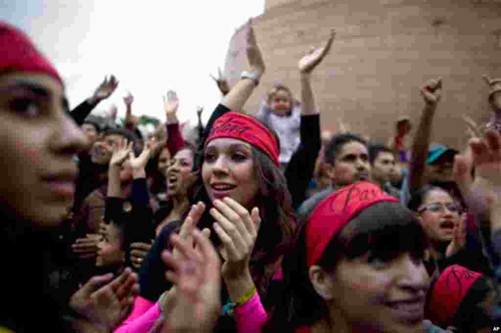 People enjoy at the Pa' bailar event, the closure night of the Innovate Tijuana festival in Tijuana, Mexico, Thursday, Oct. 21, 2010. (AP Photo/Guillermo Arias)