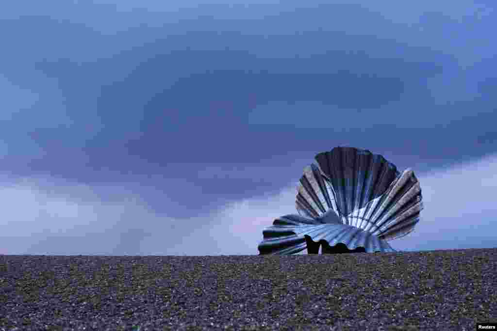 Scallop (2003) by sculptor Maggi Hambling, a tribute to composer Benjamin Britten, is seen on Aldeburgh beach, eastern England.
