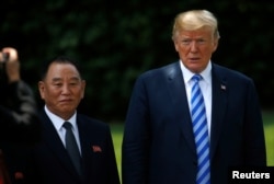 North Korea's envoy Kim Yong Chol is pictured with U.S. President Donald Trump as he departs after a meeting at the White House in Washington, June 1, 2018.