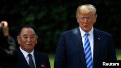 FILE - Kim Yong Chol is pictured with U.S. President Donald Trump as he departs after a meeting at the White House in Washington, June 1, 2018.