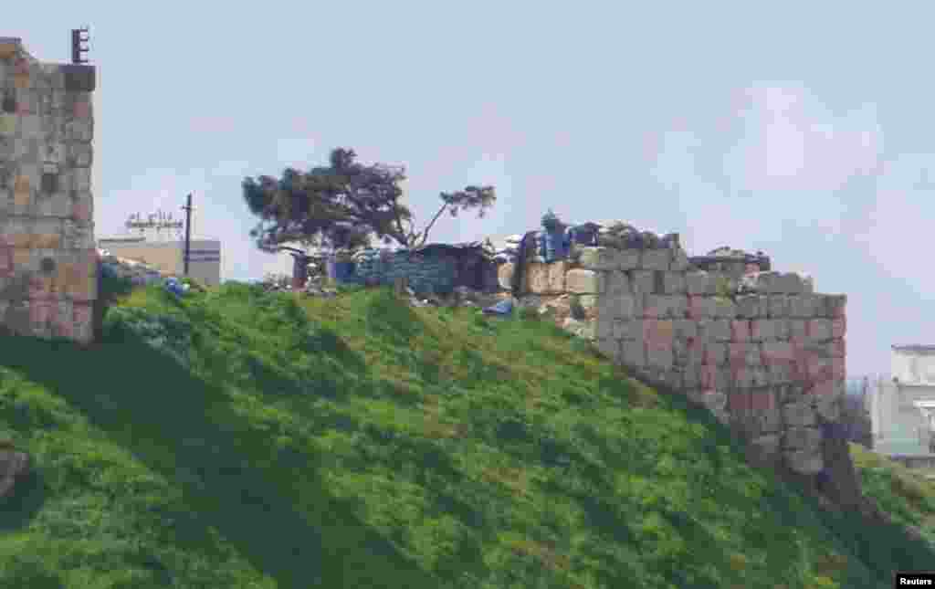 Sandbags are piled at the ancient Castle of Homs, March 4, 2013.