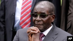 FILE - Zimbabwean President Robert Mugabe began his one-year term as chairman of the African Union at the start of the summit Friday.