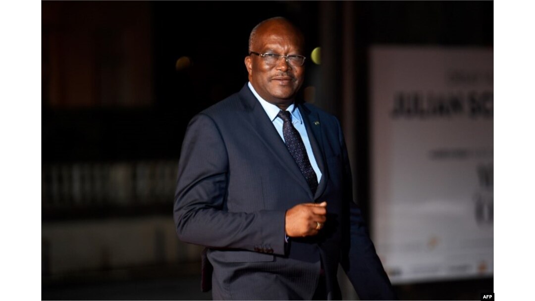 FILE - Burkina Faso's President Roch Marc Christian Kabore arrives at the Musee d'Orsay in Paris, Nov. 10, 2018.