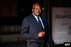 FILE - Burkina Faso's President Roch Marc Christian Kabore arrives at the Musee d'Orsay in Paris, Nov. 10, 2018.