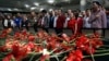 Family members, colleagues and friends of the victims of Tuesday's blasts gather for a memorial ceremony at the Ataturk airport in Istanbul, June 30, 2016.