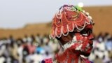 A wrestler from the Nuba Mountains tribe participates in a celebration of their cultural heritage, as part of ongoing events to commemorate the International Day of the World's Indigenous Peoples, in Omdurman August 15, 2015. 
