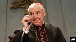 FILE - Cardinal Ludwig Mueller, prefect of the Congregation of the Doctrine of the Faith, attends a news conference at the Vatican, Oct. 25, 2016. Pope Francis on July 1, 2017, declined to renew Mueller's mandate as the Vatican's conservative doctrine chief. 
