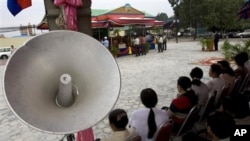 Cambodians protested at Freedom Park, demanding compensation for removing their houses. 