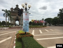 An ASEAN sign and flags at the Patuxai, a war monument known as Victory Gate. (M. A. Salinas/VOA)