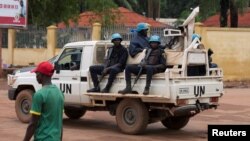 FILE - United Nations peacekeepers ride a pickup truck while on patrol in Bangui, Central African Republic, April 24, 2017. U.N. officials are expressing fears over rising ethnic tensions in the country.