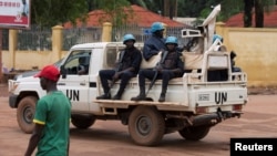 FILE - U.N. peacekeepers ride a pickup truck while on patrol in Bangui, Central African Republic, April 24, 2017, amid fears over rising ethnic tensions in the country.
