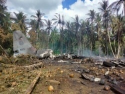 Eneo ambapo ndege ya kijeshi ilipoanguka, katika mji wa Jolo, Ufilipino.