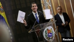 Pemimpin oposisi Juan Guaido berbicara dalam pertemauan bersama para pakar di Caracas, 16 Mei 2019.