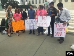 Immigrant advocates and U.S. citizens who support immigration reform vowed to fight for change in the wake of a Supreme Court ruling in a challenge to President Barack Obama's plan to extend deportation protections to millions of undocumented immigrants, June 23, 2016. (A. Barros/VOA)