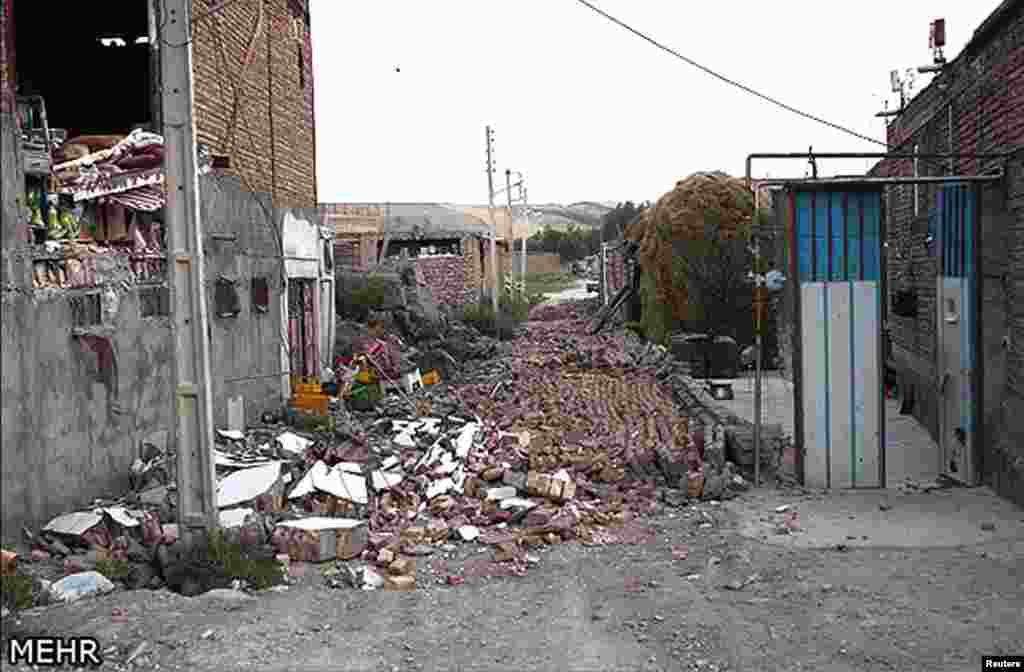 A doorway near collapsed rubble in northwest Iran, August 12, 2012.