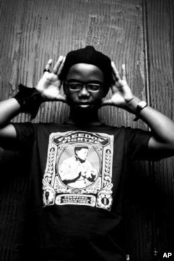 De Song wears a T-shirt bearing the image of his hero, Nelson Mandela, during a photo shoot