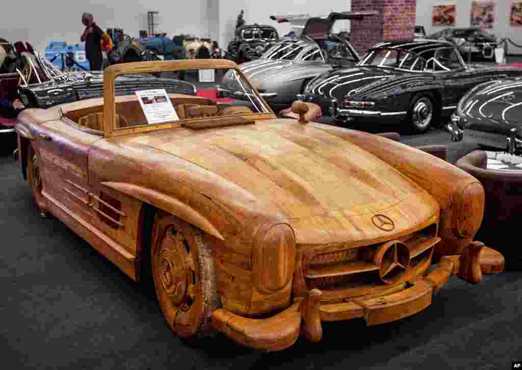 A Mercedes 300 SL Gullwing Roadster made of teak wood is displayed at the IAA Auto Show in Frankfurt, Germany.