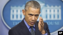 Presiden AS Barack Obama saat memaparkan rencananya untuk tahun terakhir masa jabatannya di Gedung Putih, hari Jumat (18/12).