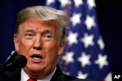 FILE - President Donald Trump speaks during a signing ceremony in the South Court Auditorium of the Eisenhower Executive Office Building, on the White House complex, Dec. 20, 2018, in Washington.