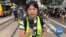 VOA Mandarin service reporter, Yihua Lee, on the streets of Hong Kong.