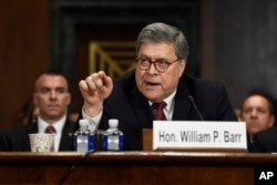 FILE - Attorney General William Barr testifies before the Senate Judiciary Committee on Capitol Hill in Washington, May 1, 2019.
