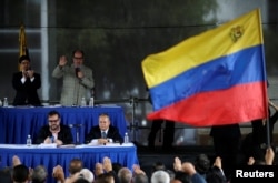 Julio Borges, top right, president of the National Assembly and deputy of the Venezuelan coalition of opposition parties, attends a session of Venezuela's opposition-controlled National Assembly to appoint alternative judges to the Supreme Court in Caracas, Venezuela, July 21, 2017.