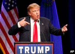 FILE - Then-Republican presidential candidate Donald Trump speaks about Army Sgt. Bowe Bergdahl at a rally in Las Vegas, Dec. 14, 2015. An Army judge has ruled Trump’s scathing criticism of Bergdahl will not prevent the soldier from getting a fair trial on charges he endangered comrades by walking off his post in Afghanistan.