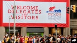 Cleveland Cavalier fans gather at the corner of East 9th Street and Euclid early Wednesday, June 22, 2016, to watch a parade celebrating the Cleveland Cavaliers' NBA Championship in downtown Cleveland, June 22, 2016. 