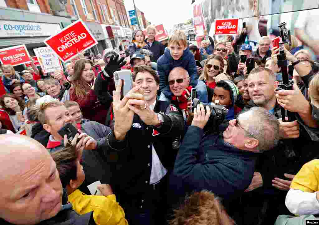 Liberal leader and Canadian Prime Minister Justin Trudeau visits a local restaurant during an election campaign visit to Tilbury, Ontario.
