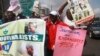 Journalists hold placards as they protest along a road days after a journalist was assaulted by mortuary attendants at the Lagos State University Teaching Hospital in Lagos, (File photo).