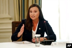 FILE - Florida Attorney General Ashley Moody speaks during a roundtable discussion at the White House in Washington, June 8, 2020.
