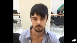FILE - This Dec. 28, 2015 photo released by Mexico's Jalisco state prosecutor's office shows Ethan Couch after he was taken into custody in Puerto Vallarta, Mexico. 