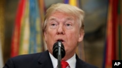 FILE - President Donald Trump in the Roosevelt Room of the White House in Washington.