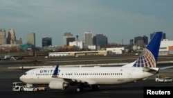 A Boeing 737 passenger plane on the platform at Newark Liberty airport in Newark, New Jersey November 15, 2012. 