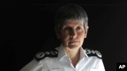 FILE - Commissioner of the Metropolitan Police Cressida Dick speaks during an interview with The Associated Press at New Scotland Yard, in London, June 10, 2017. 