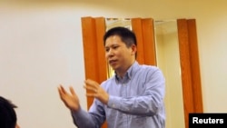 Xu Zhiyong ketika berbicara dalam sebuah rapat di Beijing pada 30 Maret 2013. 
