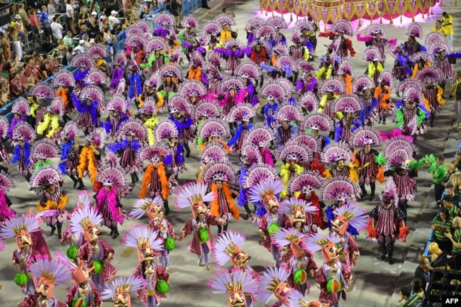 Members of the Sao Clemente samba school perform during the second night of Rio's Carnival parade at the Sambadrome in Rio de Janeiro, March 4, 2019.