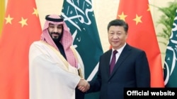 沙特阿拉伯王儲穆罕默德‧本‧薩勒曼2019年2月22日在北京與中國國家主席習近平握手