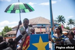 Dr. Oly Ilunga Kalenga, minister of health of the Democratic Republic of Congo, addresses residents at the town all of Mbandaka, May 21, 2018, during the launch of the Ebola vaccination campaign.