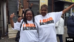 Residents of the Sandtown neighborhood in Baltimore, Maryland react to the State's Attorney's announcement ruling Freddie Gray's death a homicide, May 1, 2015. (Photo: C. Simkins / VOA)