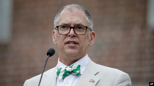 FILE - Jim Obergefell, the named plaintiff in the same-sex marriage case decided by the U.S. Supreme Court speaks during the National LGBT 50th Anniversary Ceremony, July 4, 2015, in front of Independence Hall in Philadelphia.